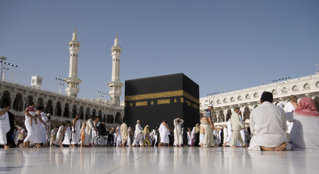 MAKKAH - APRIL 23 : A close up view of pilgrims circumambulate the Kaaba at Masjidil Haram on April 23, 2010 in Makkah, Saudi Arabia. Muslims all around the world face the Kaaba during prayer time.